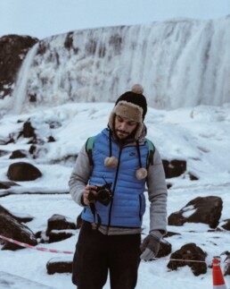 A man at Thingvellir National Park in Iceland